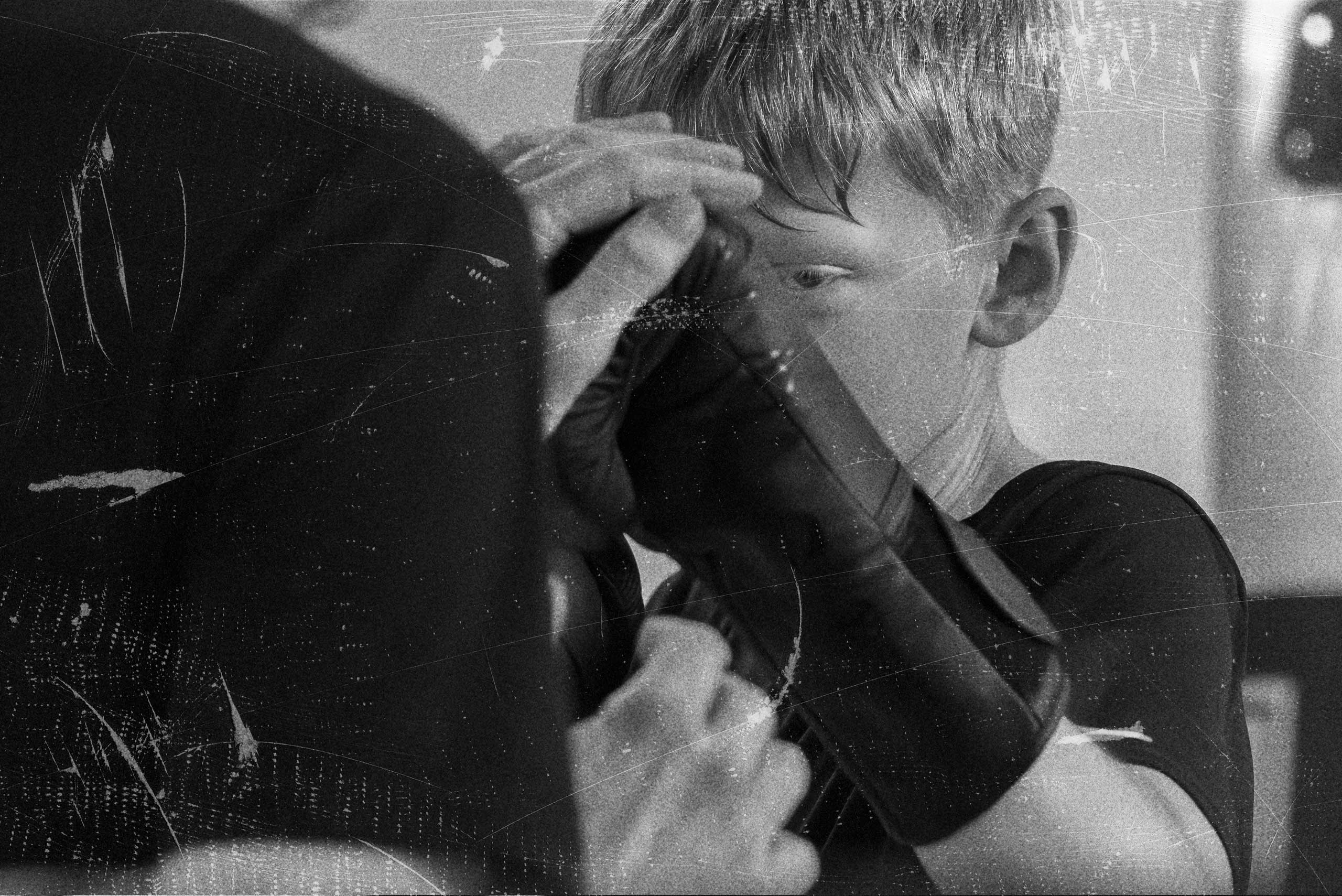 Grit boy boxing close up