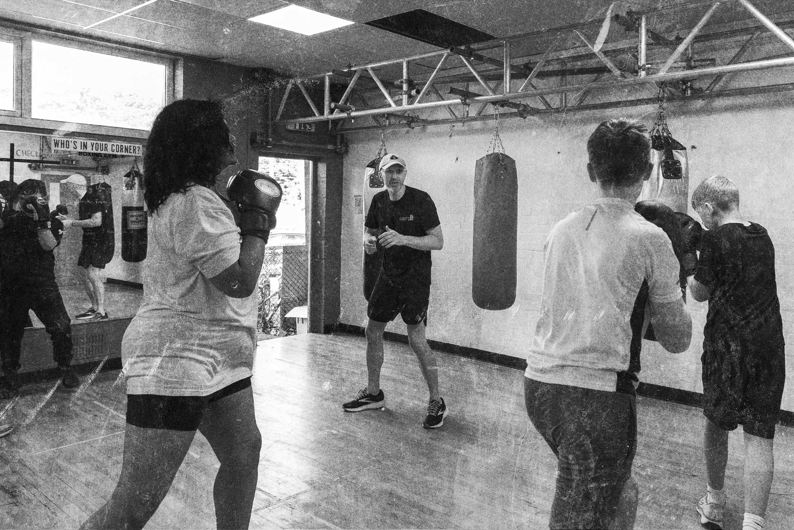 Grit kids in gym with trainer