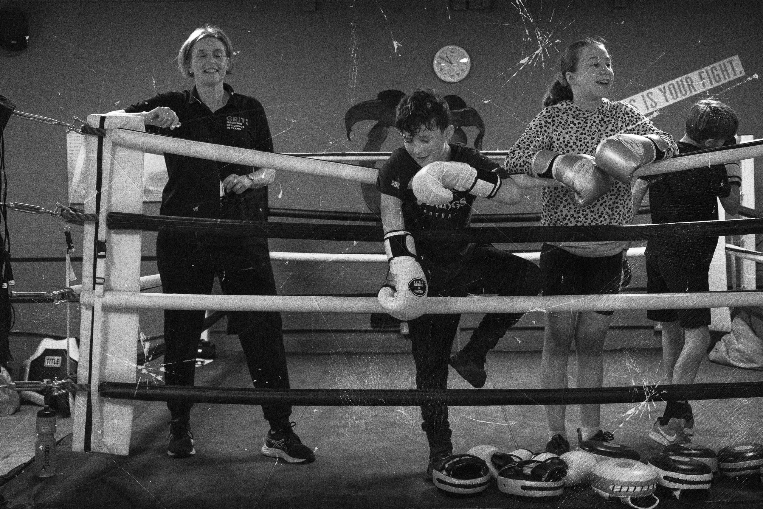 Grit kids leaning on ropes