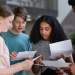 Image of teens getting exam results - results day tips for parents