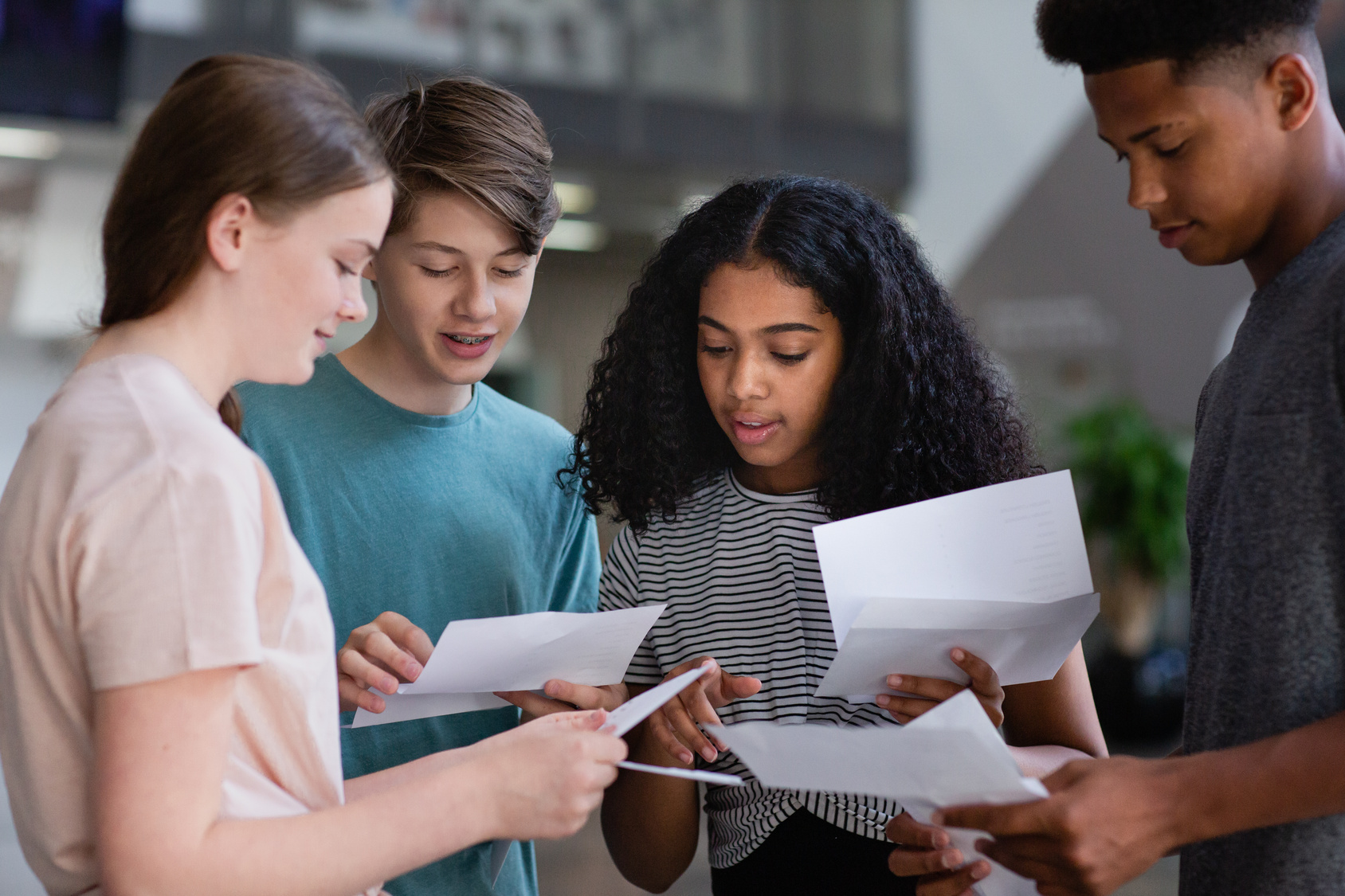 Image of teens getting exam results - results day tips for parents