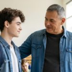 Man talking to a young person